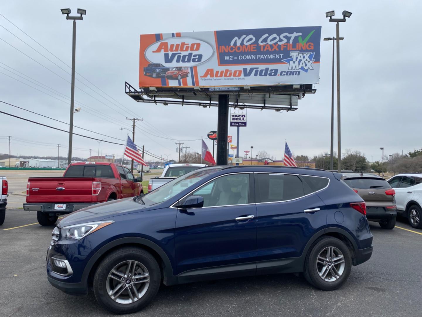 2017 BLUE Hyundai Santa Fe Sport 2.4 FWD (5XYZU3LB6HG) with an 2.4L L4 DOHC 16V engine, 6A transmission, located at 420 I-35E, Lancaster, TX, 75146, (469) 297-4144, 32.593929, -96.823685 - Photo#0